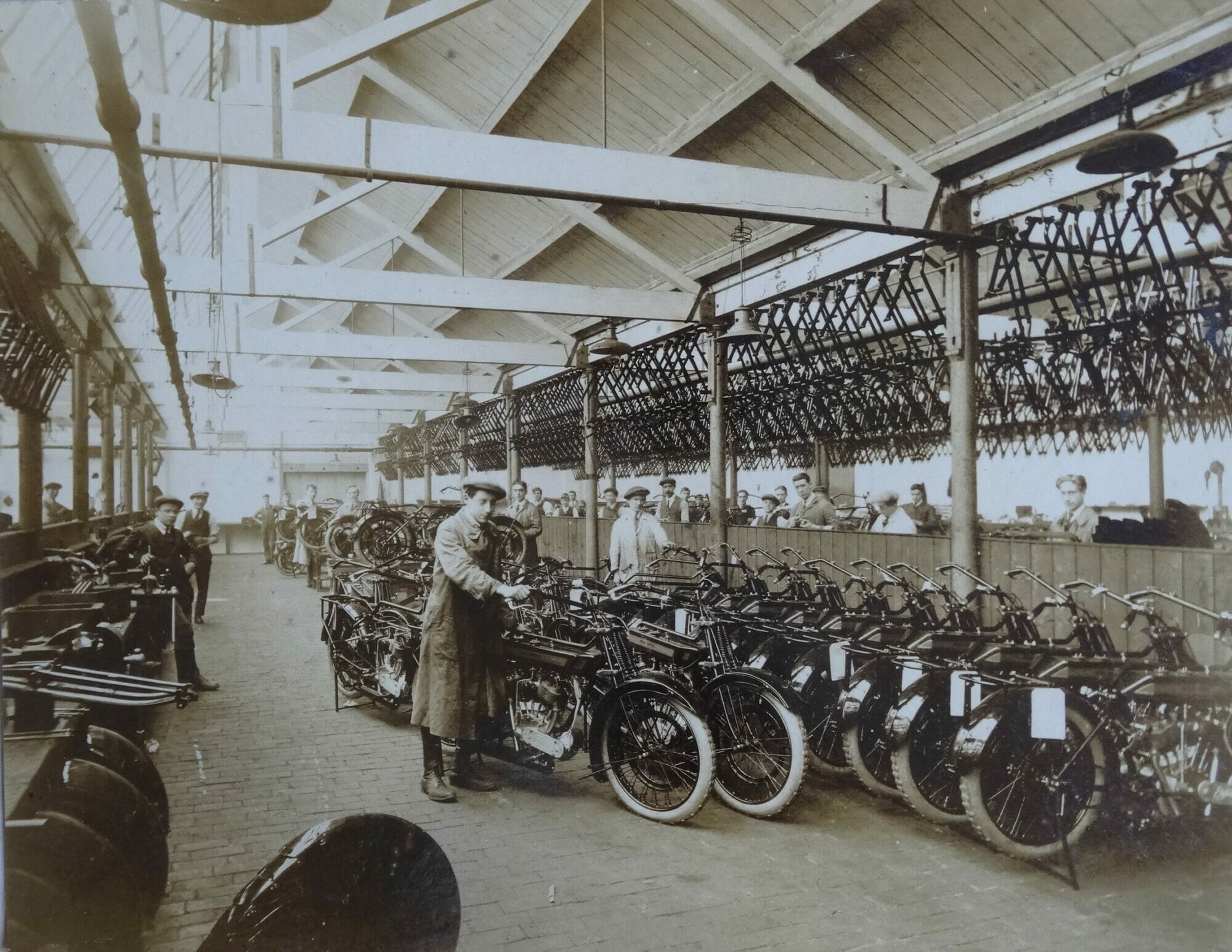 Early 1920s motorcycle assembly shop.