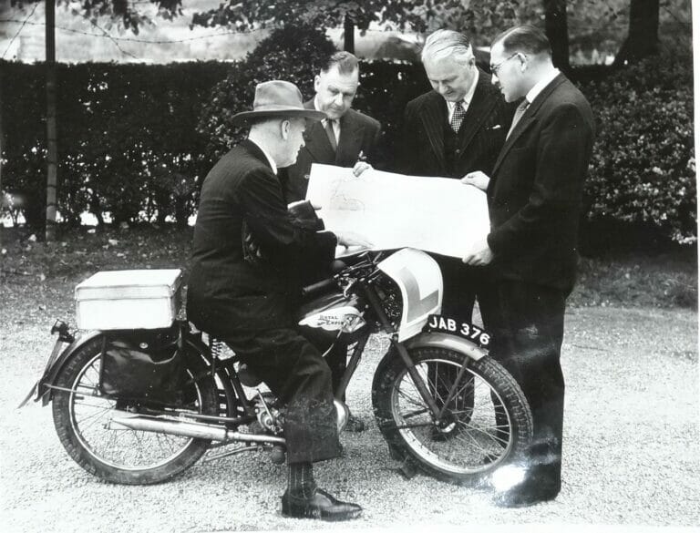 A picture of Mr Tschiffley on his RE 125 after touring for 3000 miles in Spain.