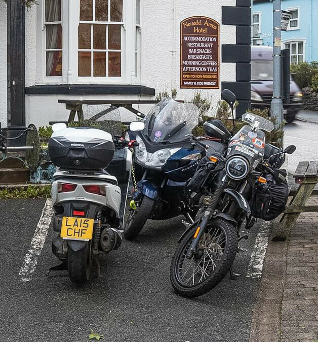 Part of our group outside the Neuadd Arms Hotel, Sherpa the Himalayan on the right